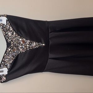 Short strapless diamond black dress, worn for semi dance.